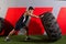 Man flipping a tractor tire workout gym exercise