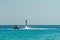 Man on flyboard above the clear sea. Water extreme sports