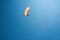 man flying on paraglider blue sky on background Ukraine Crimea