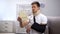 Man in foam cervical collar and arm sling reading medical bill, shocking price