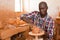 Man focused on work on pottery wheel