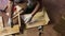 The man folds the boards, tries on one another. Makes a storage box for harvesting vegetables. Harvesting vegetables during the