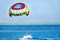 Man is fond of parasailing over Red Sea. Tropical resort in Egypt