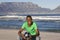 Man With Football On Table Mountain Beach