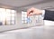 A man in formal suit holds a key in a modern loft panoramic apartment or office. Rent or buy new home or office. New York view.