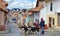Man with four goats crossing a street, Cuenca
