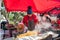 Man frying Japanese style noodle in a vendor