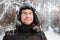 Man in fur winter hat with ear flaps smiling