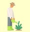 Man gardener waters a bed with a flower palnt. Vector iluustration in the flat design