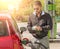 Man at gasoline tank