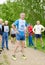 Man getting ready for running competition among elderly athletes