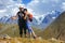 A man with a girl. Trekking in the mountains