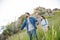 Man and girlfriend going down a mountain