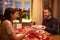 Man Gives Woman Gift At Romantic Valentines Day Meal