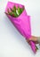 Man is giving bouquet of fresh tulip buttons covered with pink paperÑŽ Male hand with flowers isolated on white background.