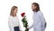 Man giving a rose to woman for apologize. woman with Unhappy, angry wife refuses apology. Relationship problem.