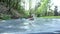 Man gliding through water slide