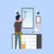 Man in gloves and apron cleaning mirror with squeegee guy in bathroom doing housework concept rear view male character