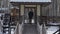 Man going on the bridge and standing on wooden building