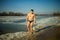 Man Going To Swim In The Winter Lake In The Ice Hole