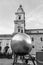 Man on the golden ball statue, modern art titled Sphaera by Stephan Balkenhol at the Kapitelplatz, Salzburg, Austria