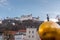 Man on the golden ball statue, modern art titled Sphaera by Stephan Balkenhol at the Kapitelplatz, Salzburg, Austria