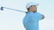 Man golfer making short-distance shot to land ball on green, luxury hobby