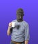 Man in Gorilla Mask Holding Coffee Mug on Isolated Background