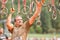 Man Grabs Onto Suspended Rings At Extreme Obstacle Course Race