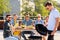 Man grilling on bbq at rooftop party