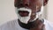 Man grooming barber shop black guy shaving face
