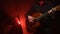 Man on the guitar plays a flamenco girl dancing. Light from behind. Smoke background