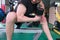 Man in gym with dumbbells closeup