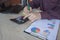 Man hand with calculator at workplace office.