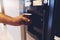 Man hand with coffee, vending coffee machine