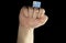 Man hand fist with Uruguayan flag isolated on black