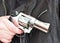 Man with hand gun pistol rubber attack violence