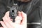 Man with hand gun pistol rubber attack violence