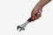 Man hand hold Wrench