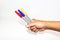 Man hand holding the colorful marker pen