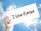 Man Hand Holding Paper with text I Love Europe . Sign on white p