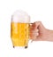 Man hand holds beer in mug.