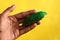 Man hand on karela or bitter gourd,momordica Charantia,wild Bitter Gourd, Bitter Cucumber,copy space with selective focus