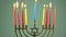 Man hand lighting candles in menorah table served for Hanukkah