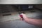 Man hand open the garage door with remote control