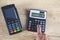 Man hand payment terminal with calculator