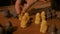 Man hand placing figures for medieval popular strategy board game - tafl