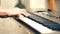 Man hand playing musical keyboard indoors