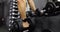 Man hand takes dumbbells for bodybuilding in gym