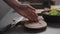 Man hand touching wood board on home kitchen